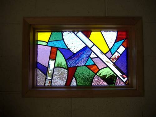 Abstract coloured leadlight panel in a timber frame